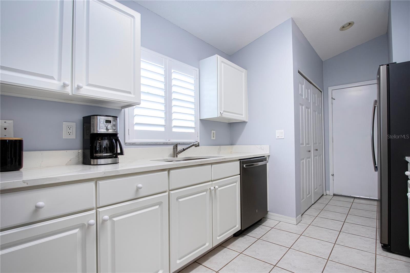Kitchen with corian countertops