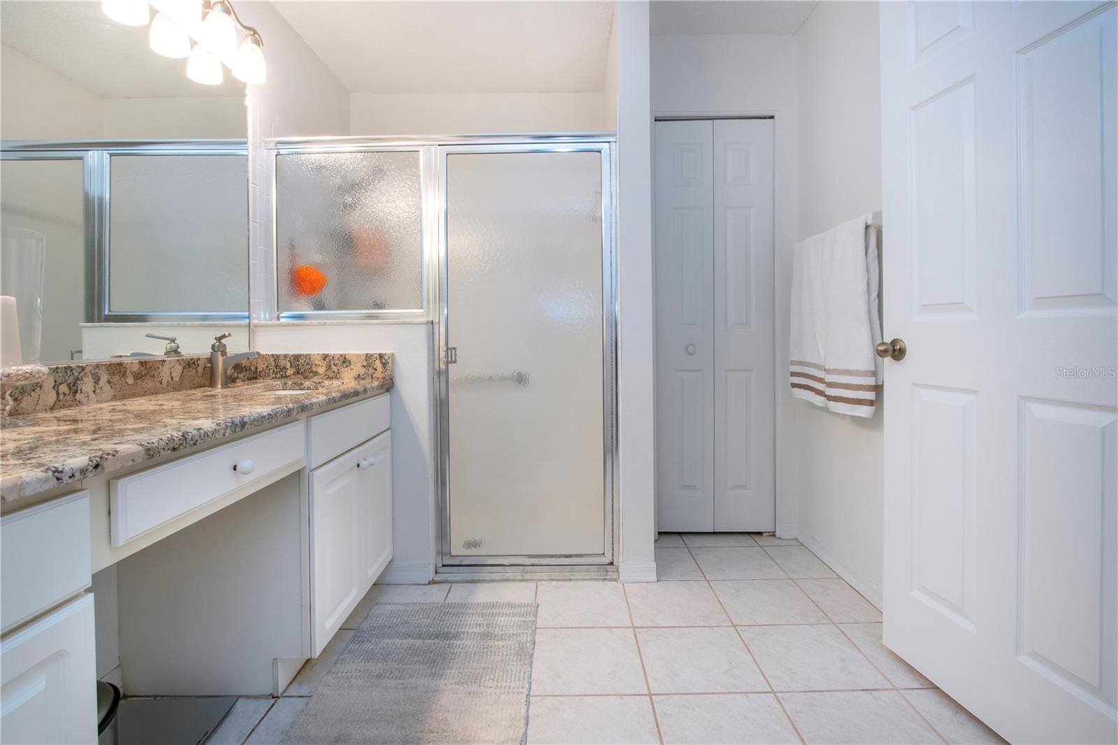 Master shower and linen closet