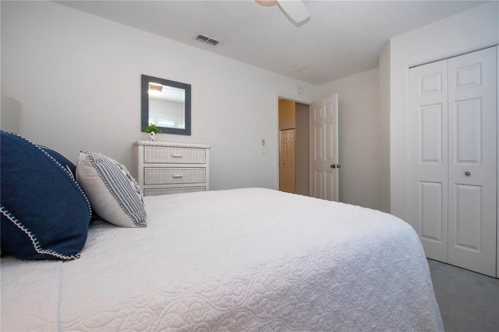 Guest bedroom with wall closet
