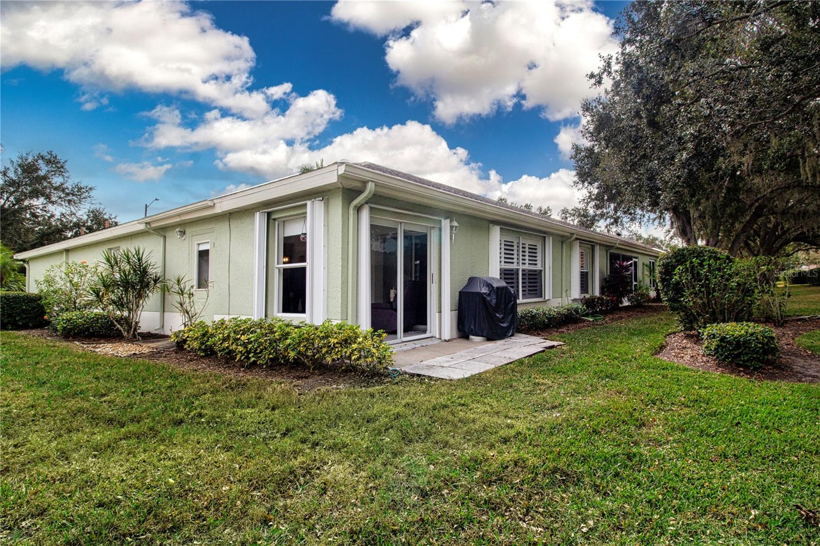 Backyard from Florida room sliding doors.