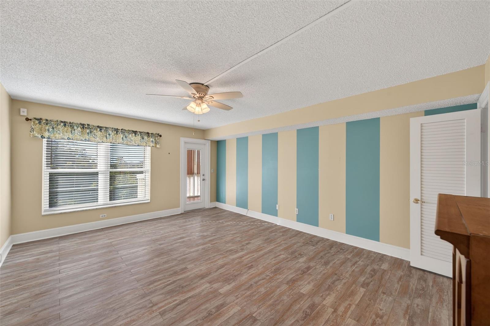 Bedroom 3 with entry to the Florida Room can double as an office or den.