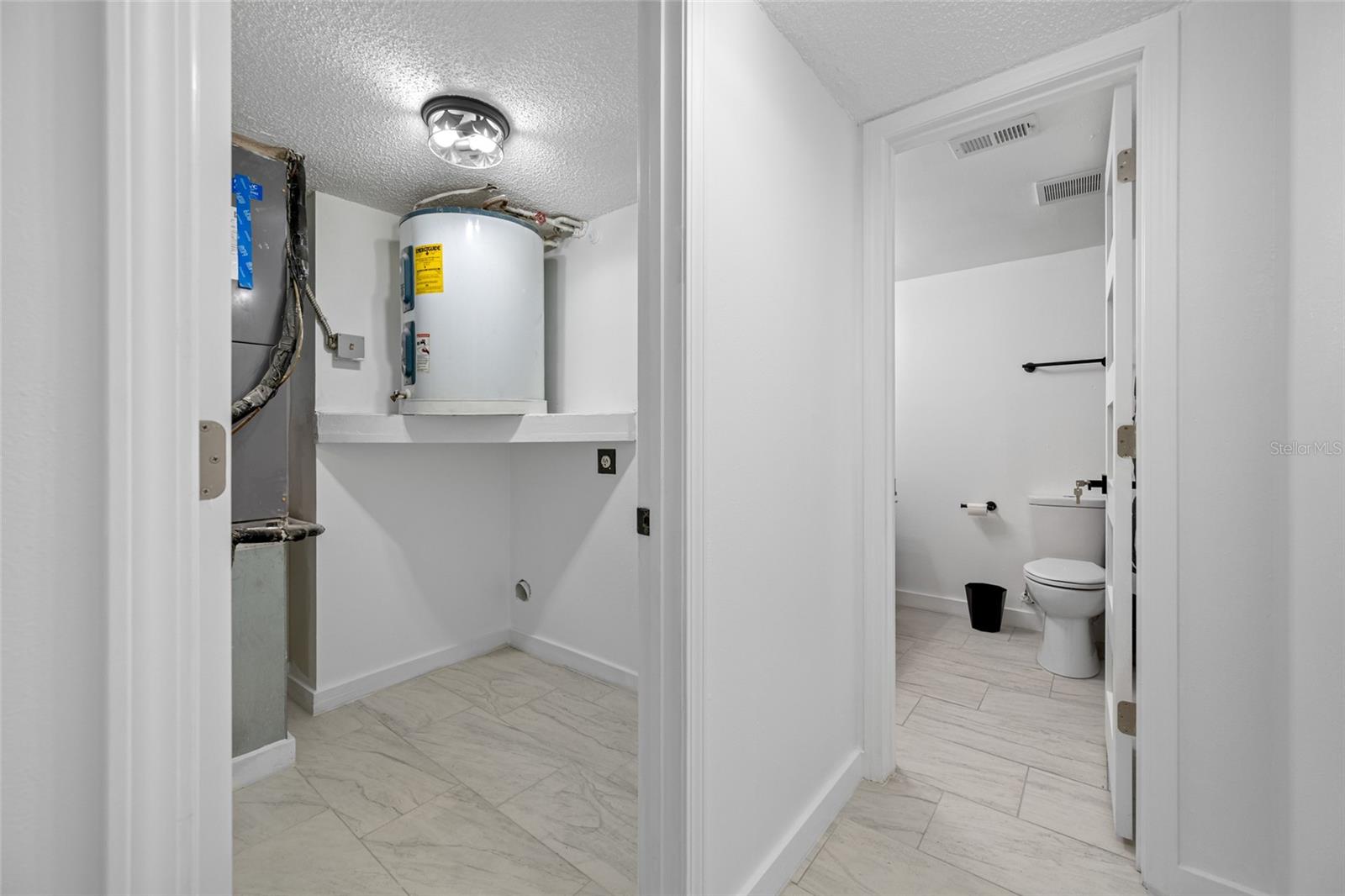 Hallway leading to 2nd bathroom