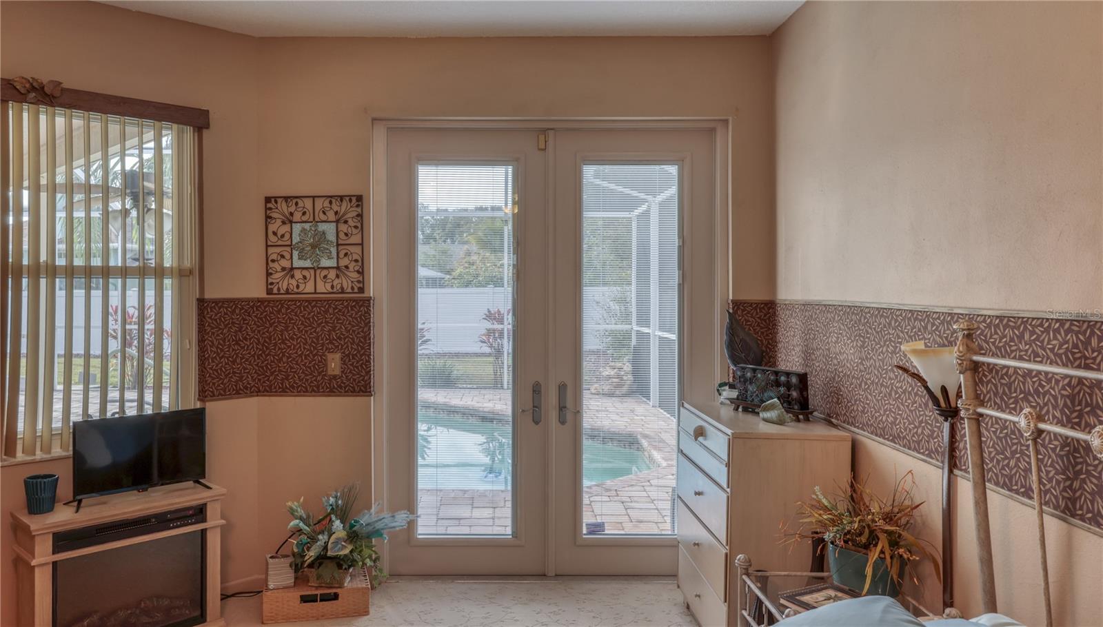 Primary Bedroom -French Doors to Lanai