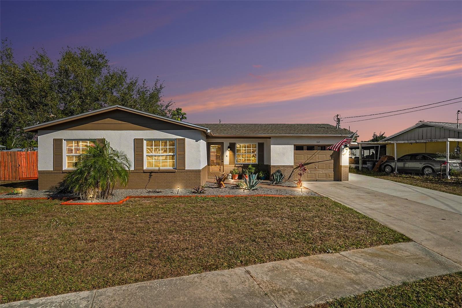 Welcome to your Apollo Beach retreat! This charming corner-lot home boasts a beautifully landscaped front yard and inviting curb appeal