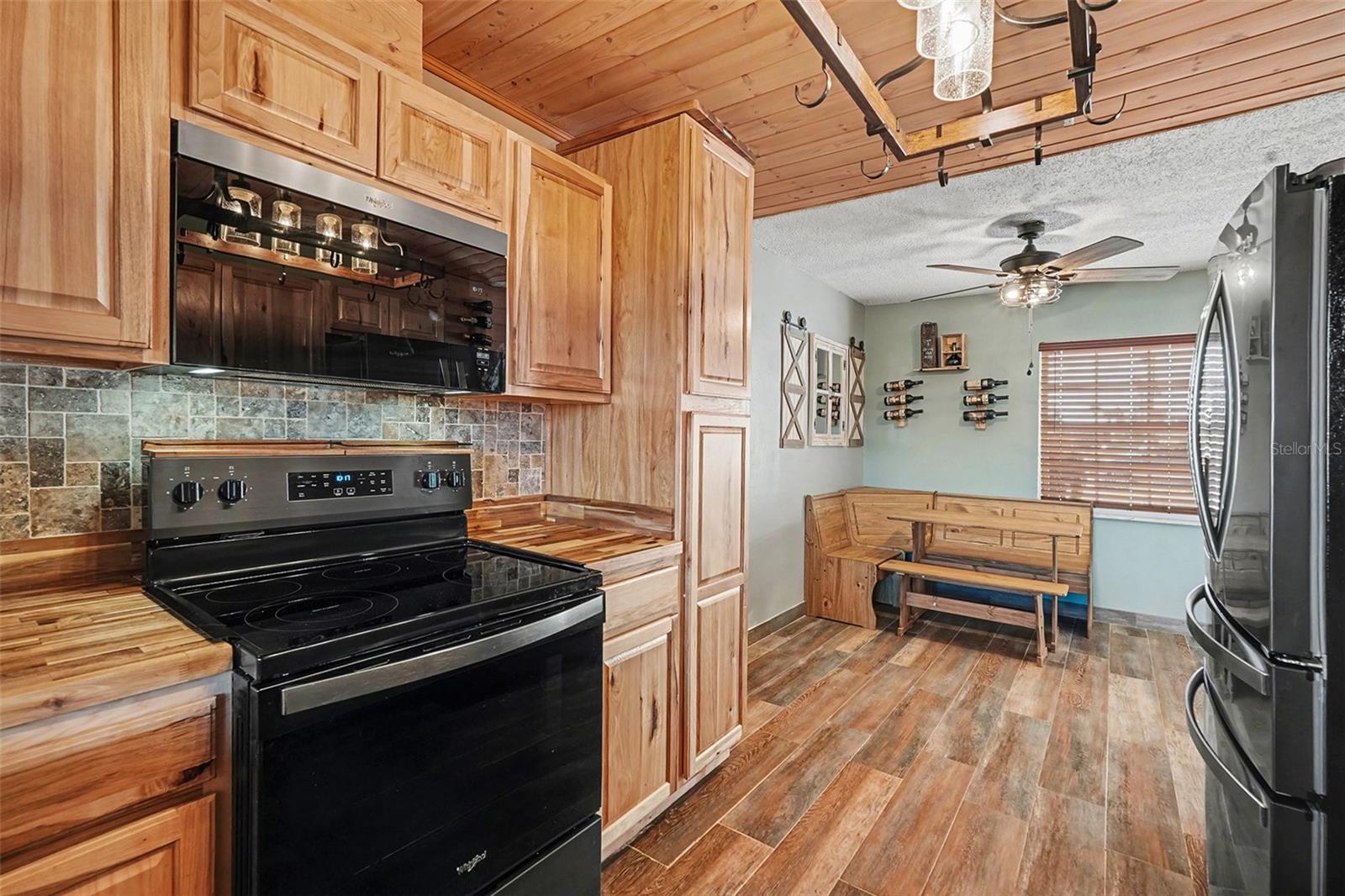 Functional kitchen layout with ample storage, modern appliances, and seamless flow into the dining area—perfect for everyday living and entertaining