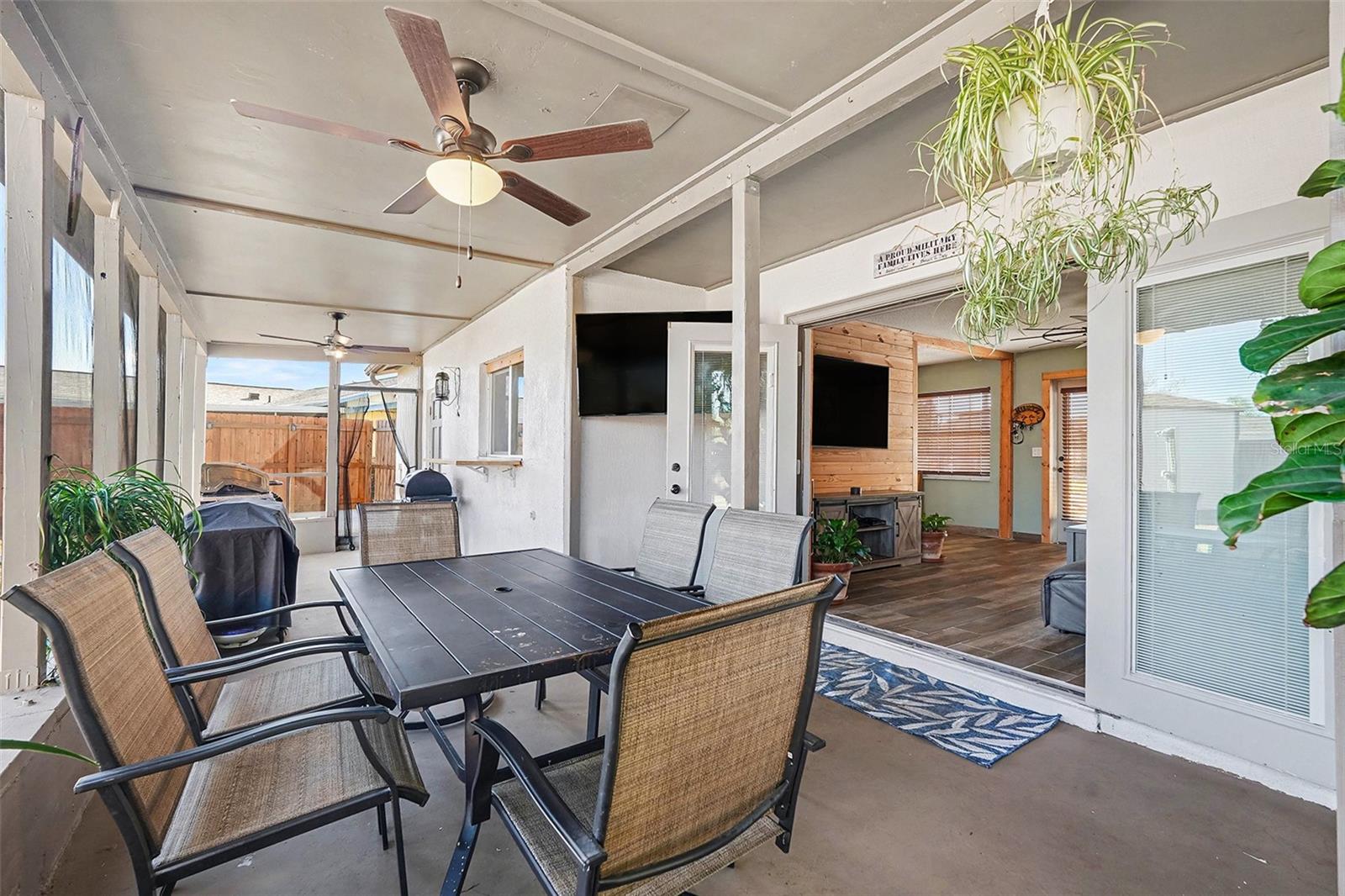 Large screened-in porch with direct access to the home, creating a versatile extension of the living space