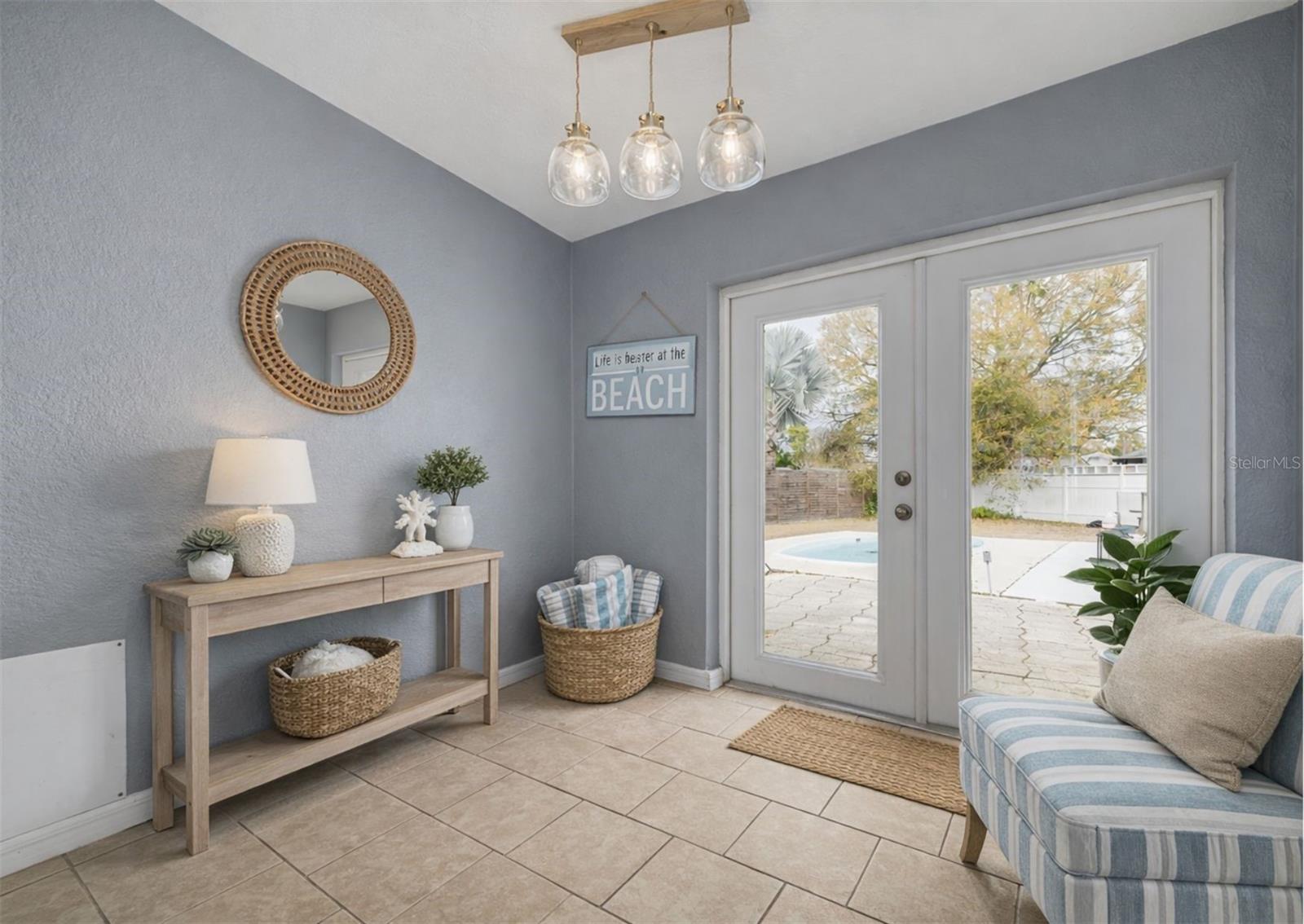 Sitting/Mud Room leading to pool