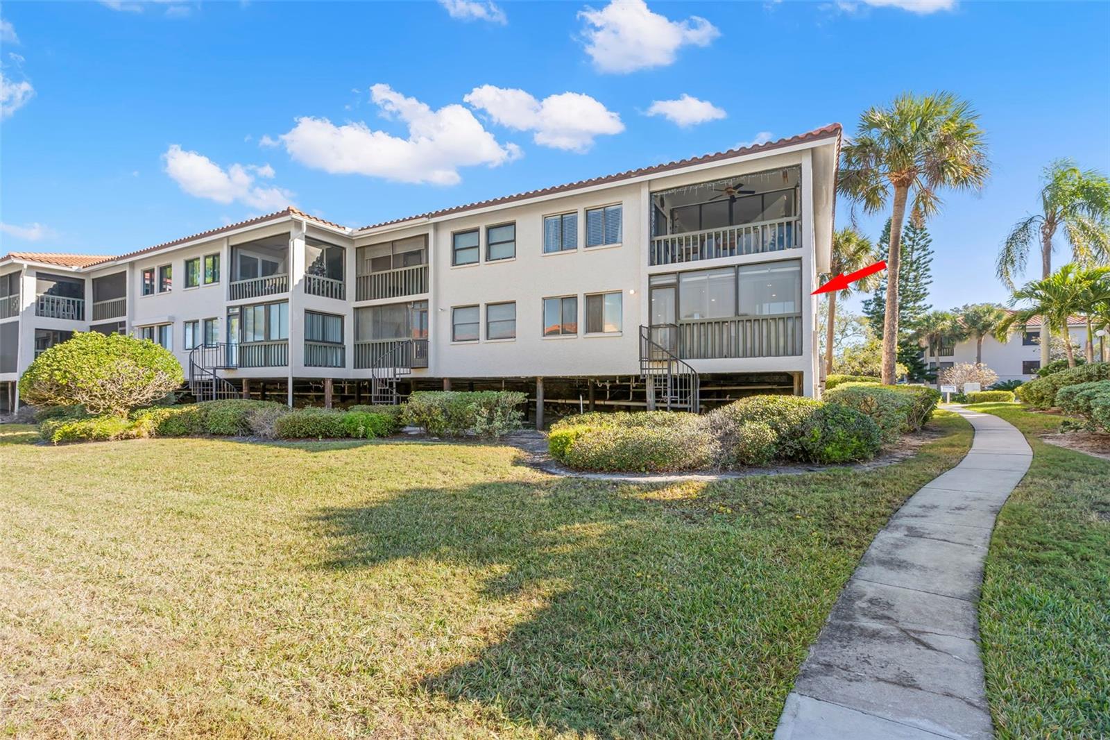 1st floor corner unit with spiral staircase to the ground level from the screened balcony.