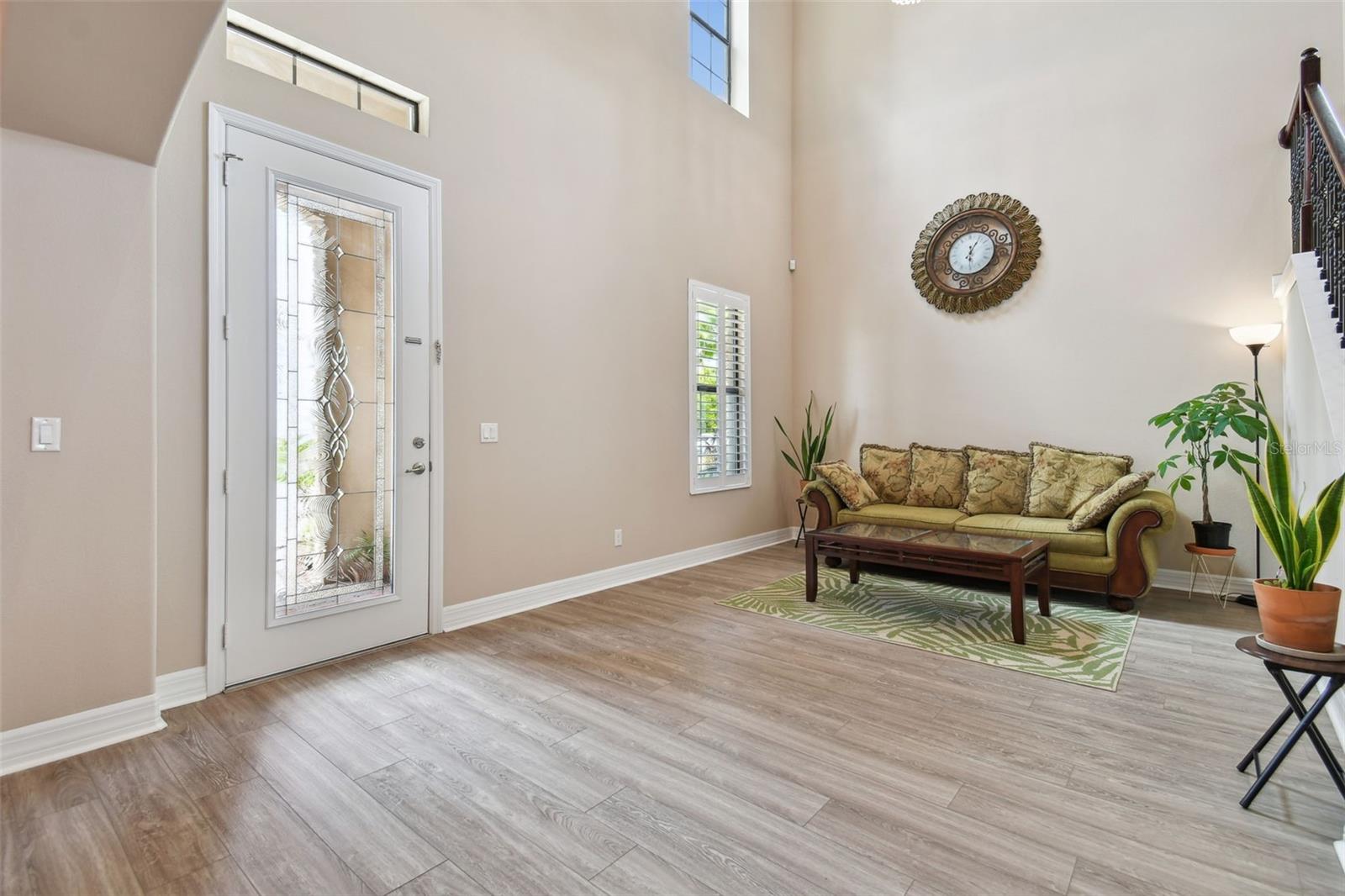 A large and open entry has a very tall ceiling!