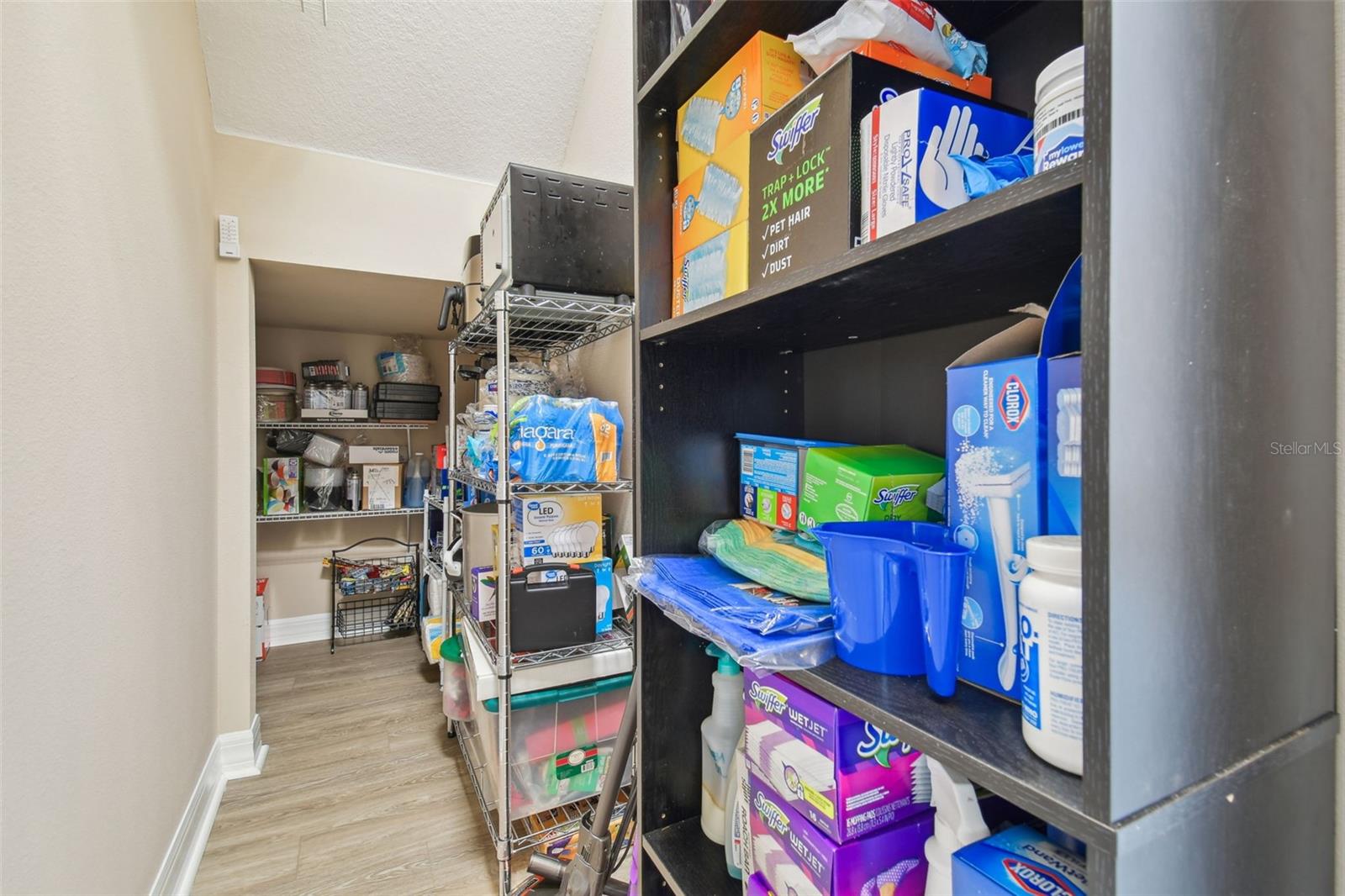 This is a wrap-around storage closet that goes around the corner (not shown) and under the stairs! No wasted space here!