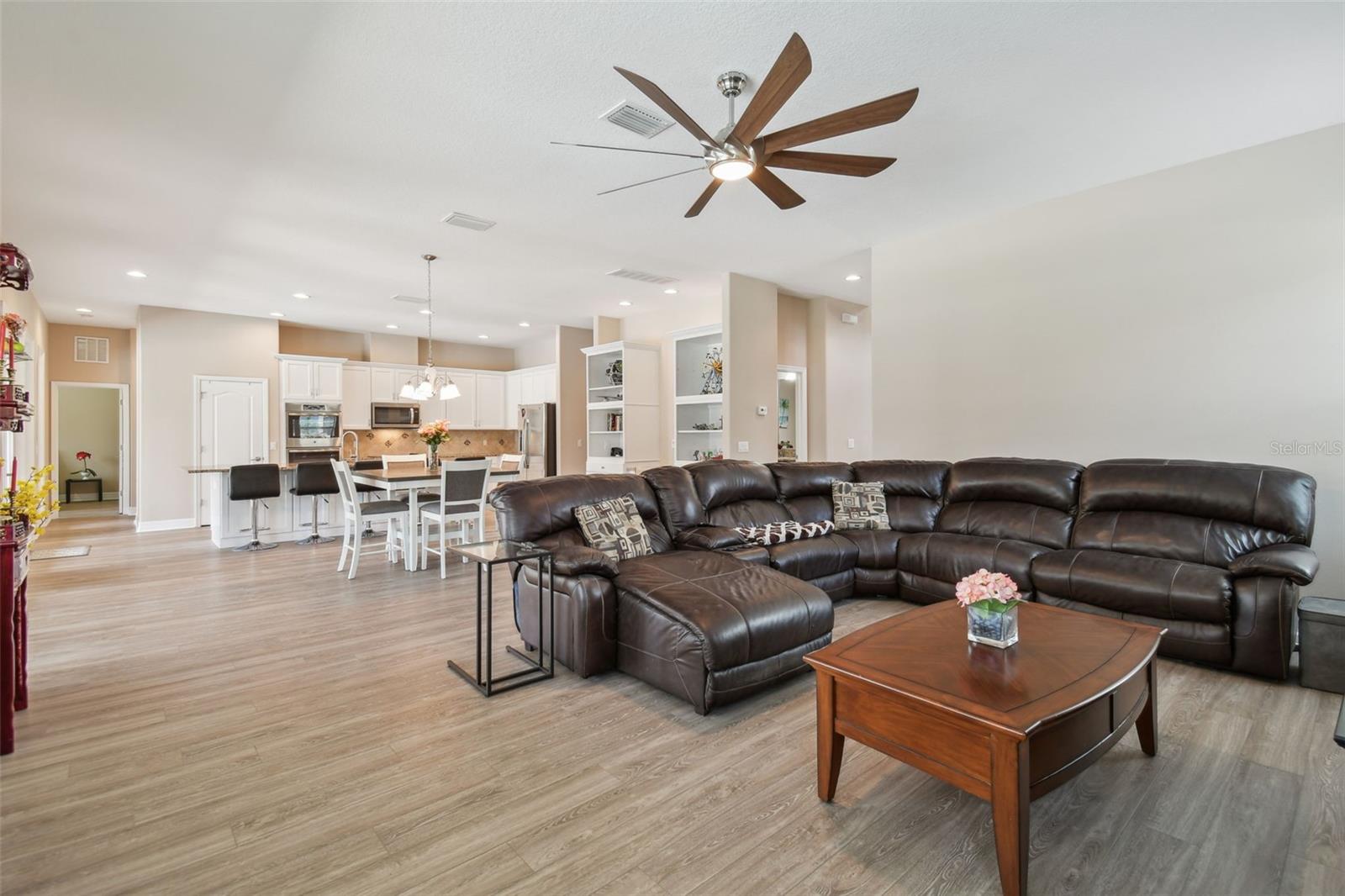 This open living area allows for views of the lake and pool all across the back of the home!