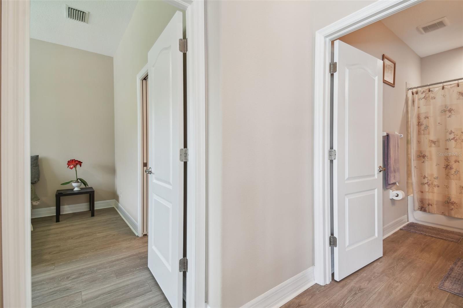 Next to the kitchen in the full Pool Bath and the first floor In-Law or Guest Suite