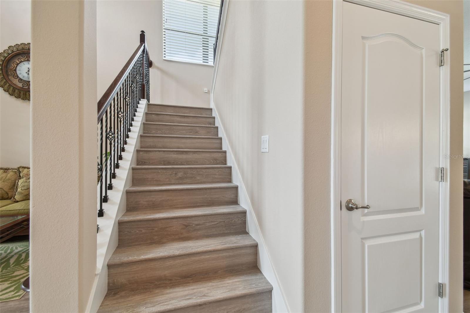Heading to the second floor, the home has luxury vinyl flooring throughout, including on the stairs!