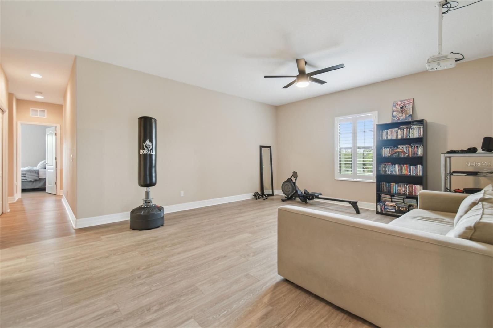 From the balcony, you enter into a very large upstairs gathering area. Great for games or movies!