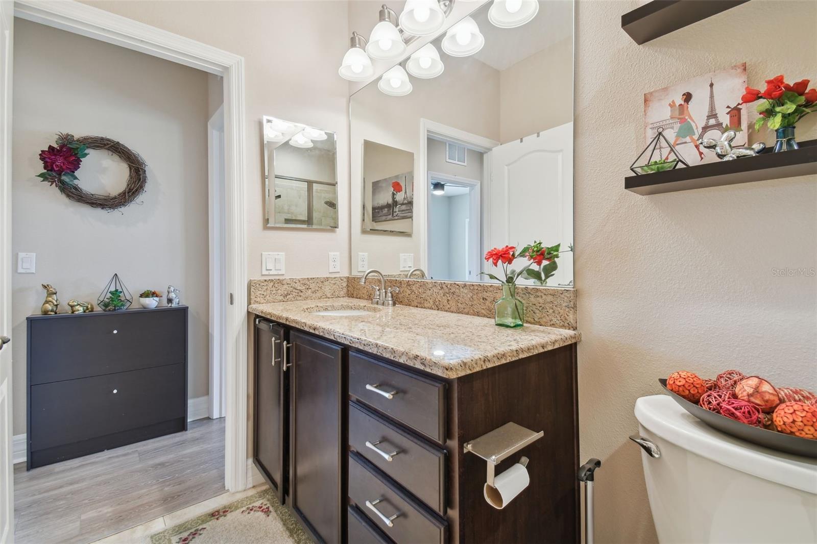 An extra full bathroom upstairs and also features a full walk-in shower!