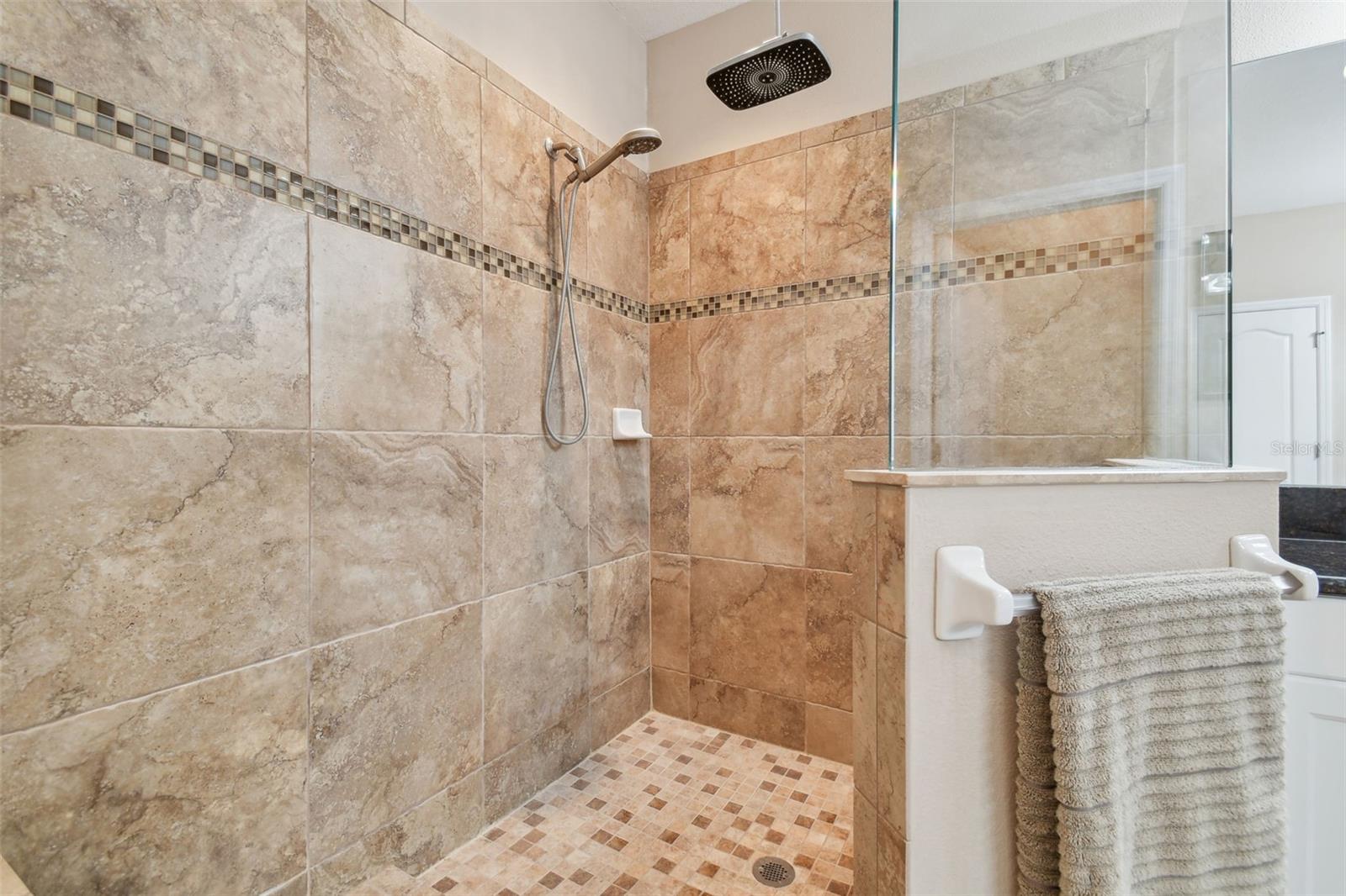 The large walk-in shower provides room to wash!