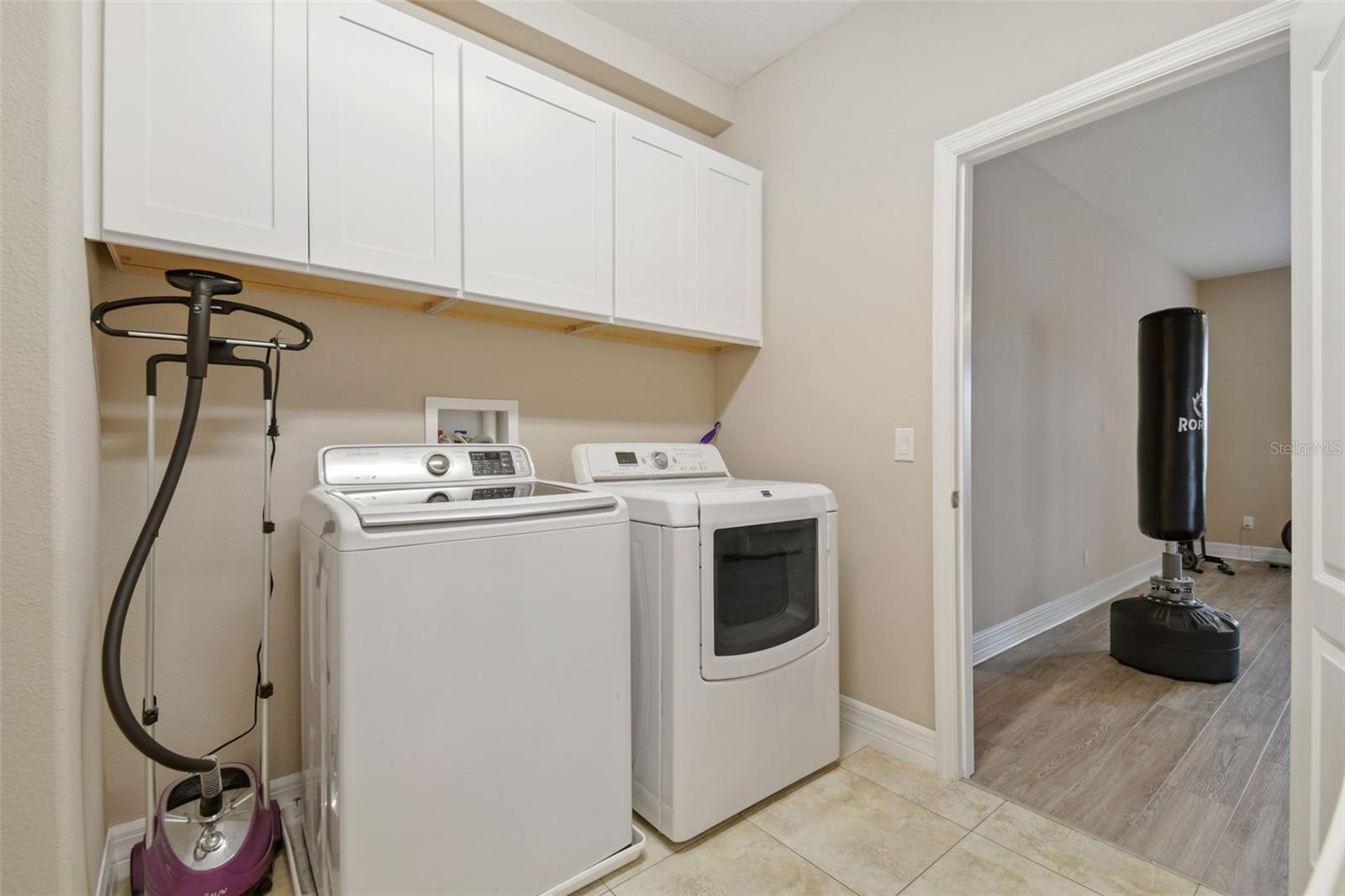 An attached upstairs laundry room offers a lot of convenience.