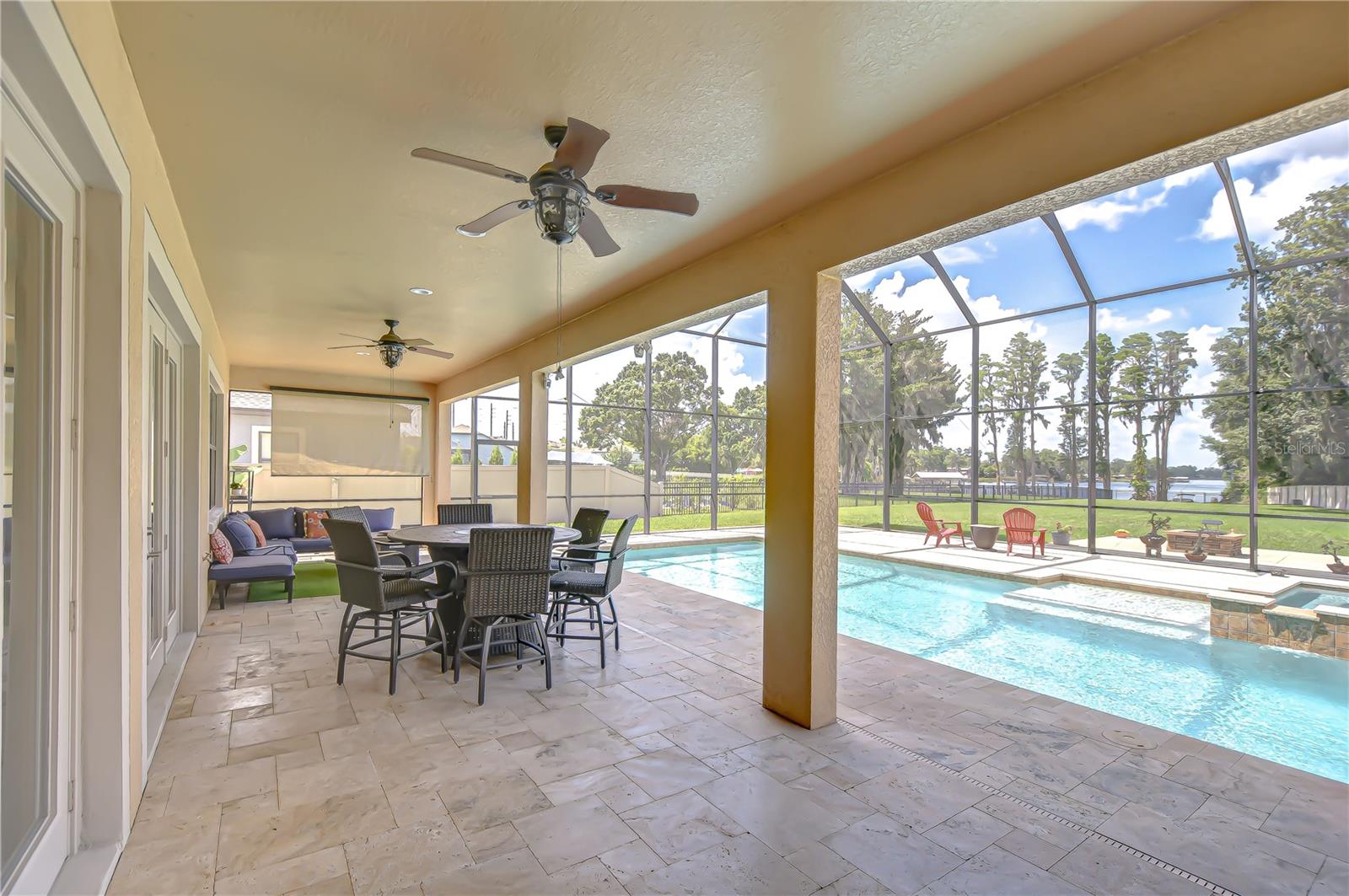 There are such beautiful views out of the heat of the sun with the expanded covered patio area!