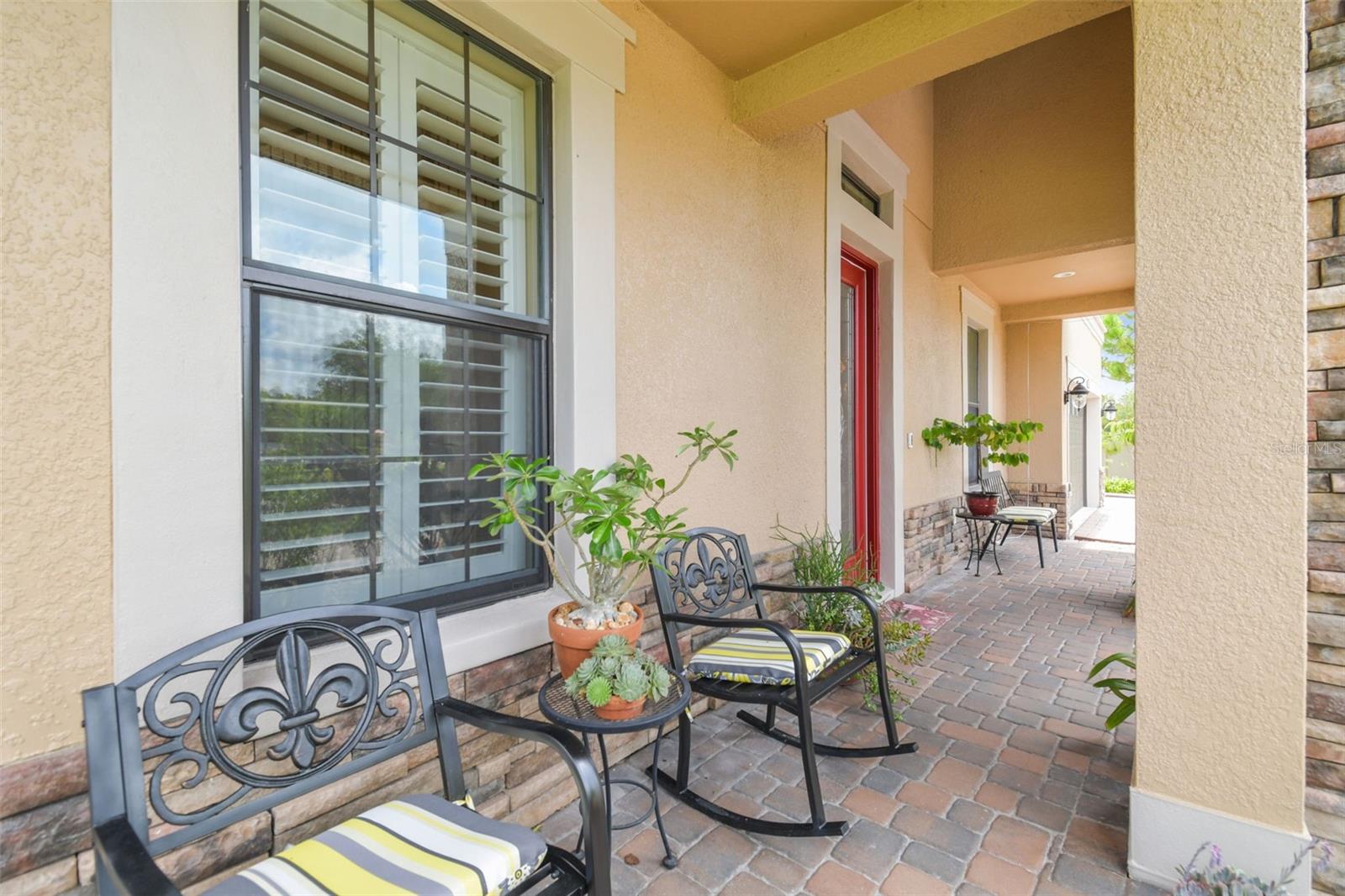 The front covered porch awaits your visitors.