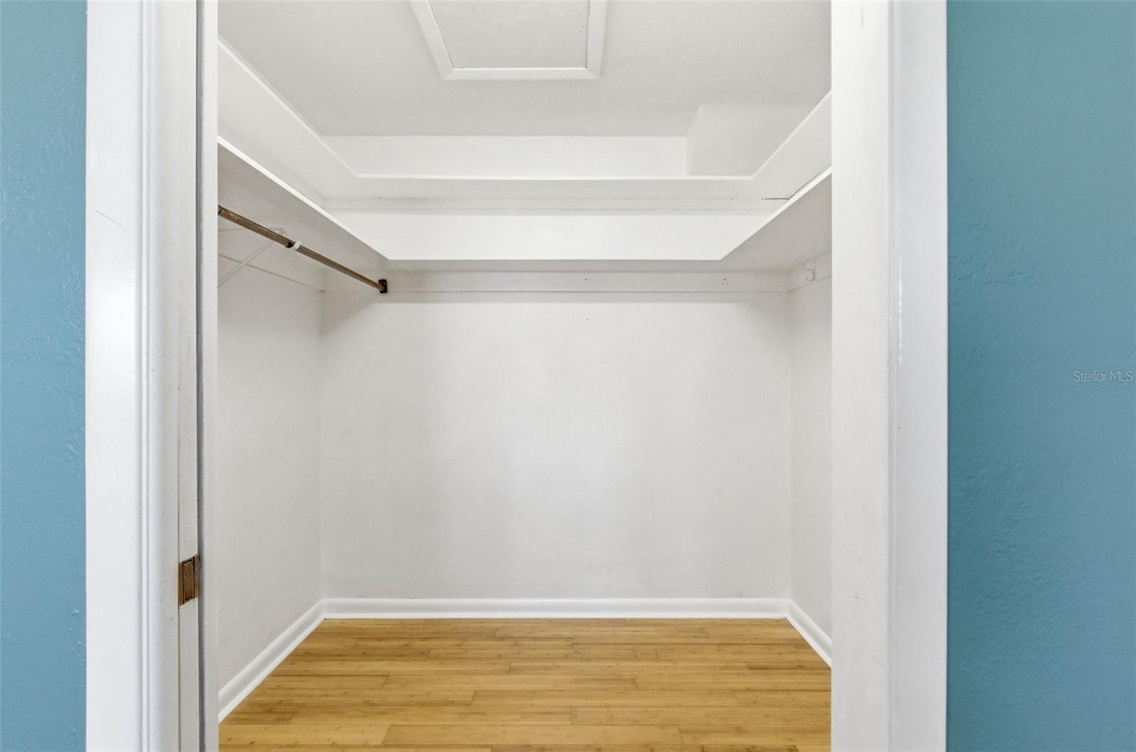 Primary walk-in closet.