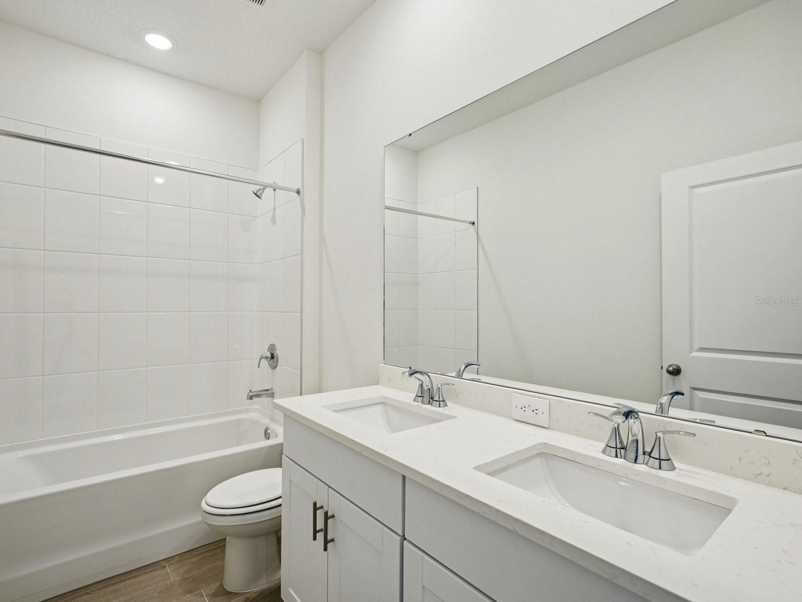 Interior photos are not of the actual home but are photos of the builder home with the same floorplan with similar interior finishes and features.