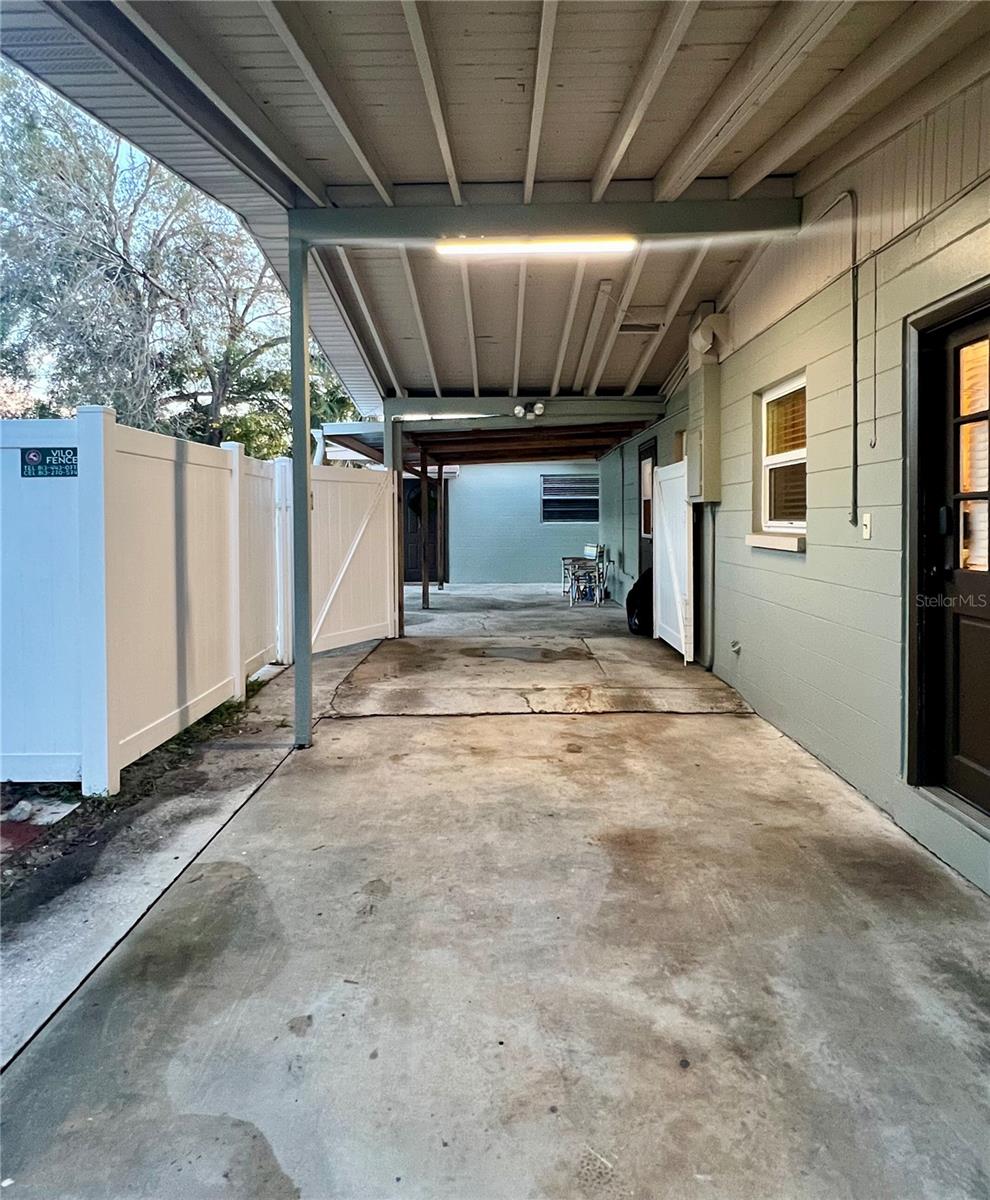 Oversized carport with gates