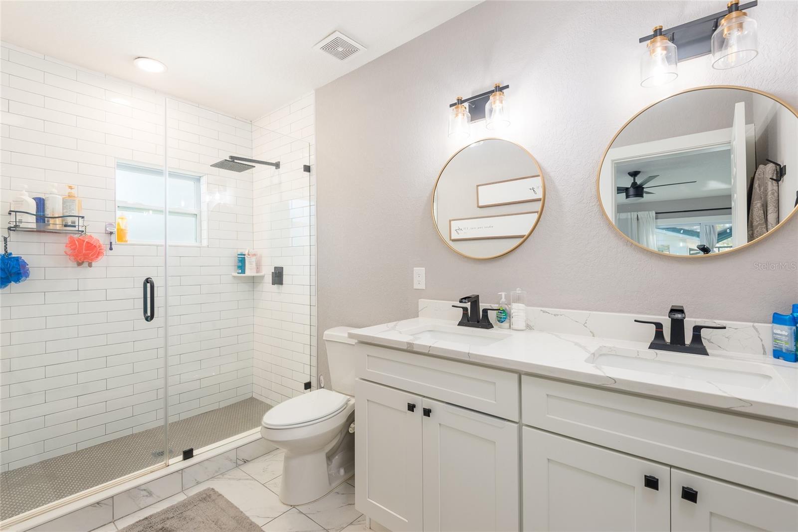 En Suite Bath, ston counters, dual sinks, walk in shower with rain head