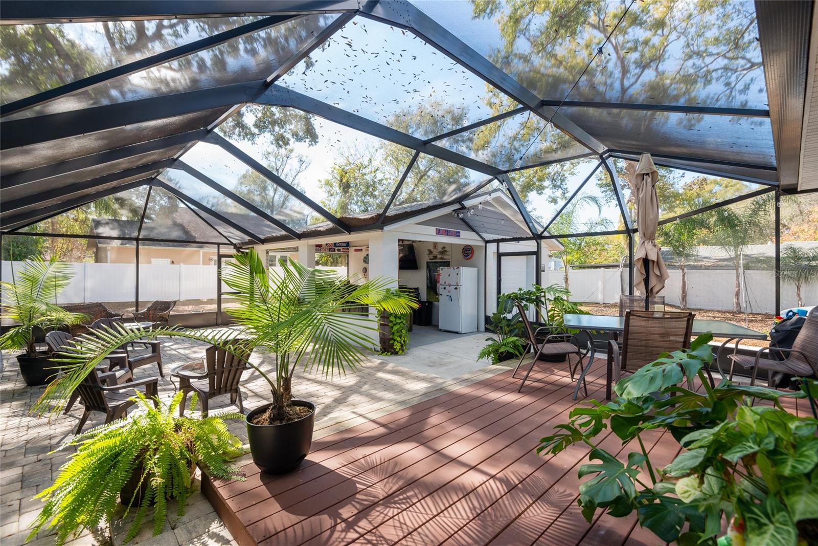 back deck area , built in covered bar, refrigerator, plumbed, great for entertaining