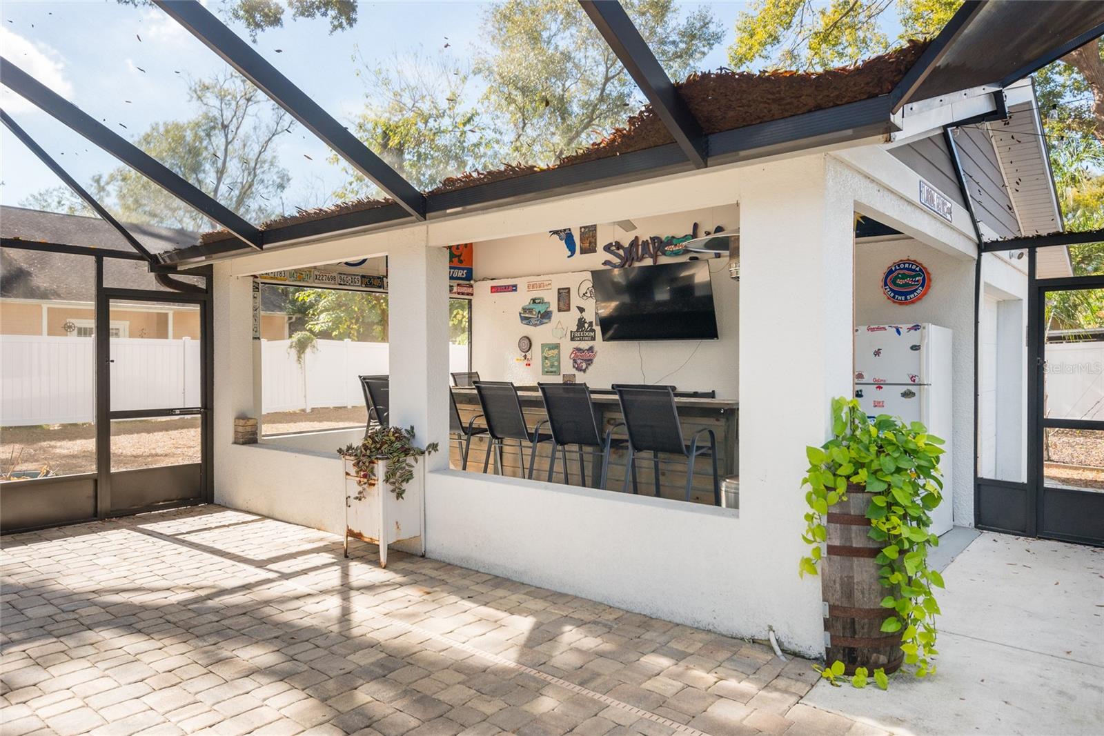 Bar, entertainment area, covered and fully screened