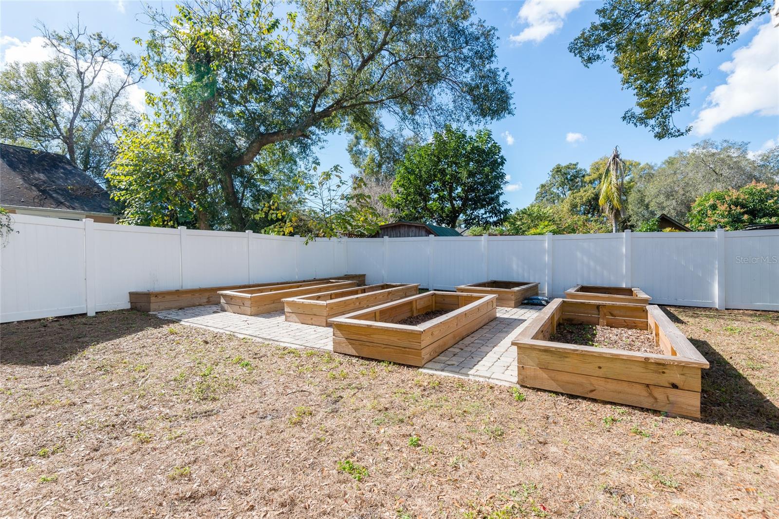 Pavers placed below above ground planters