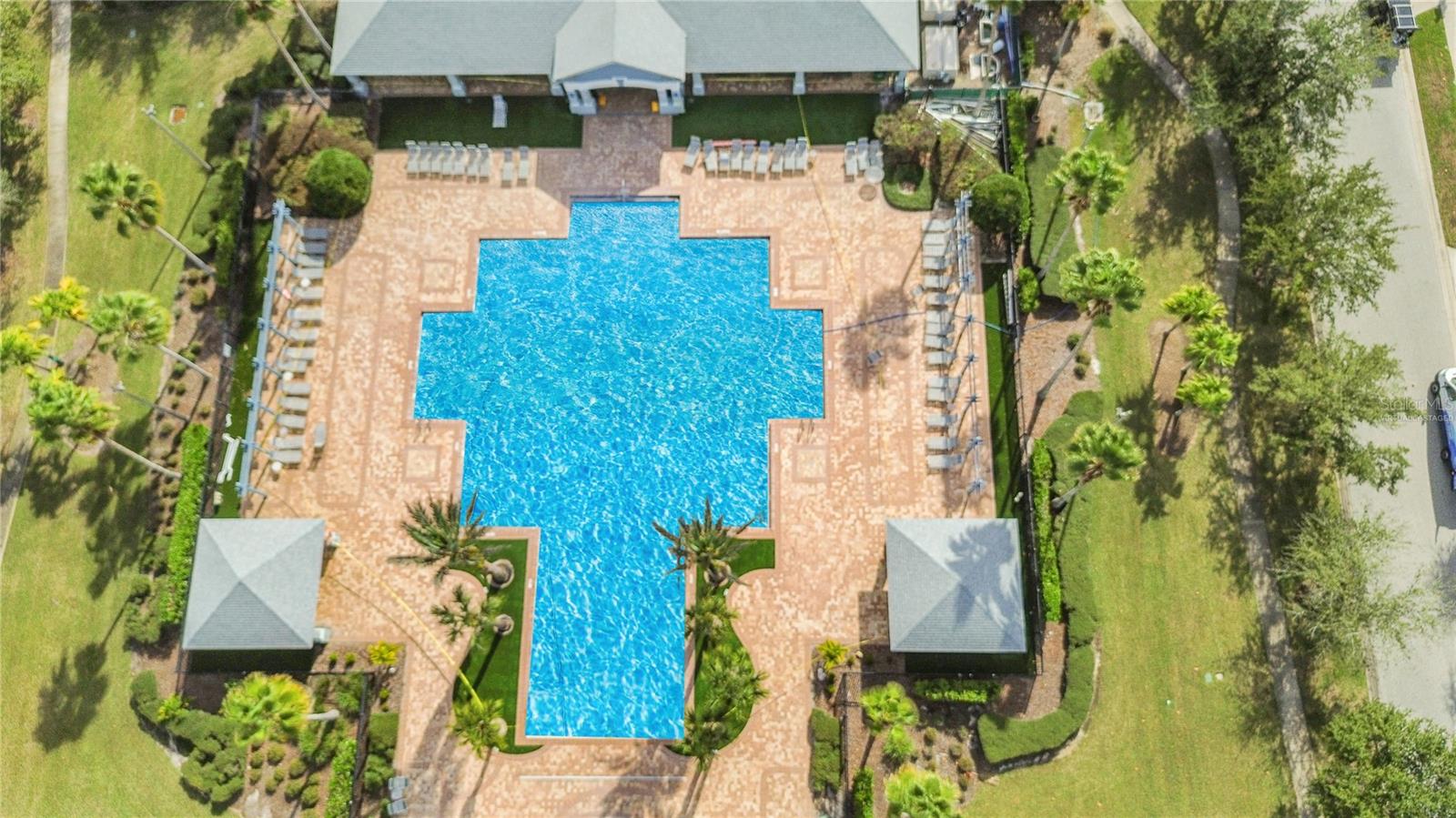 Clubhouse, Community Pool & Kids Splash Pad. Pool water is virtually staged-it is currently being worked on.