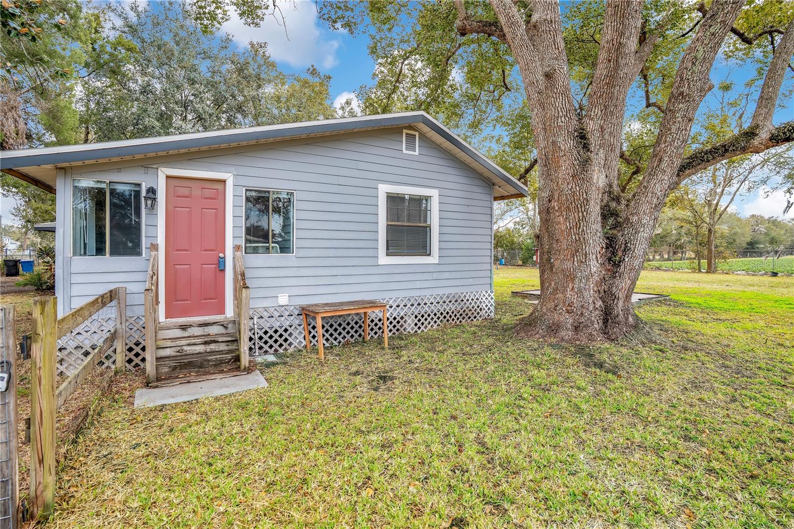 Side Door (West) - leads to Laundry Room.