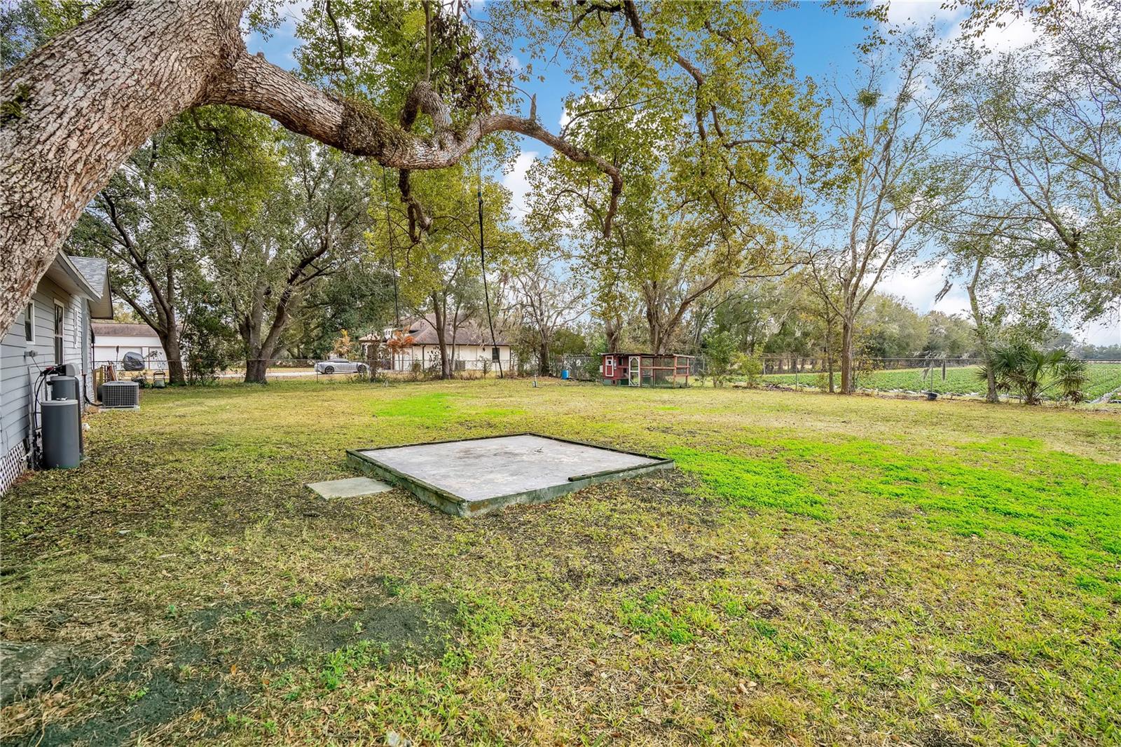 Concrete pad in backyard.
