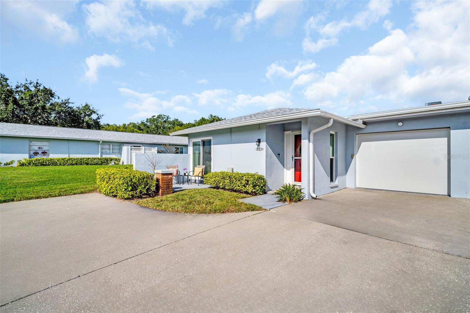 New insulated garage door, glass storm door & tile entry~