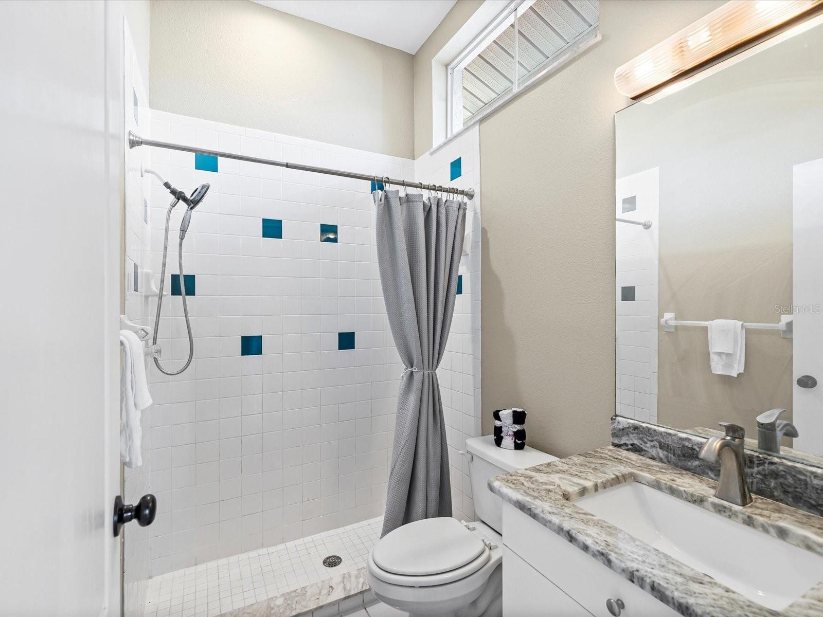 Full bathroom - Access from pool area from back of home