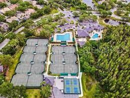 Community amenities include tennis and pickleball courts