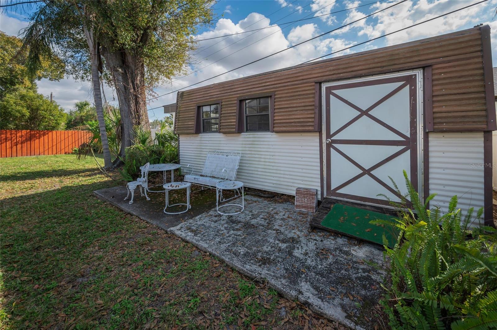 structure in backyard can be used for storage
