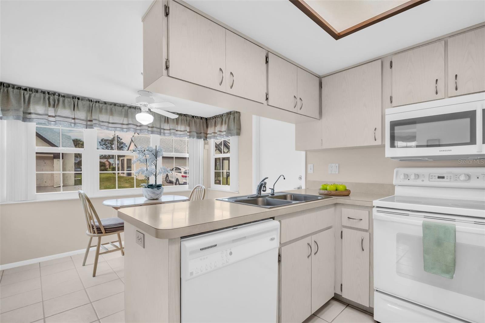 Open to the breakfast nook for casual dining & garage access~