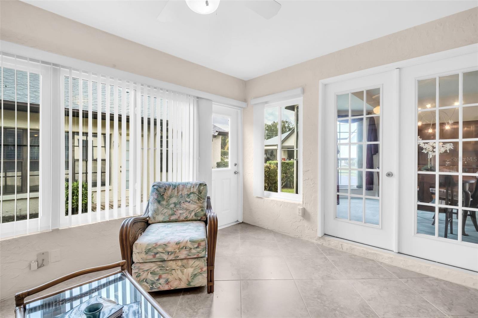 Rear access door and double doors to the formal dining room~