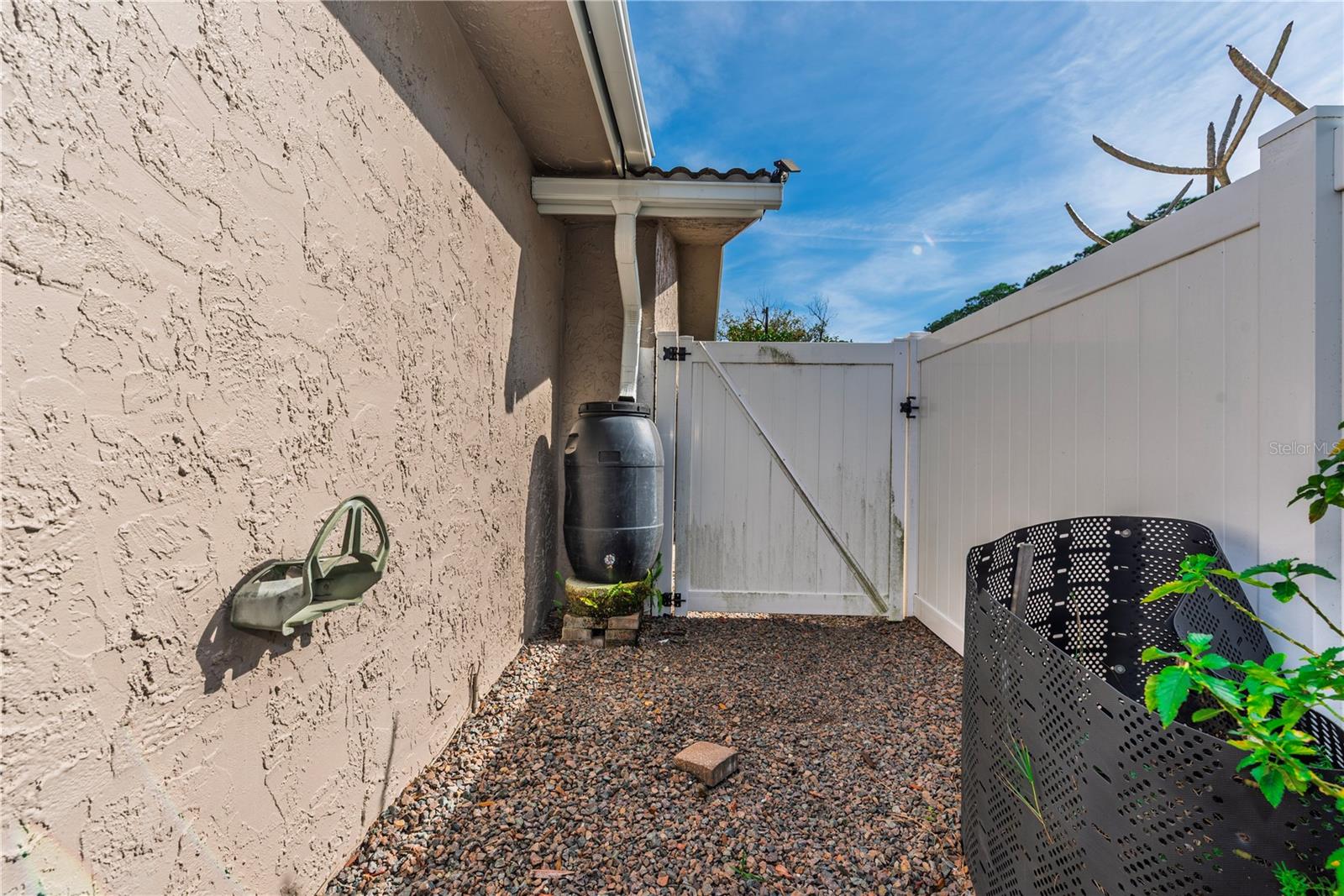 Side yard with gate.