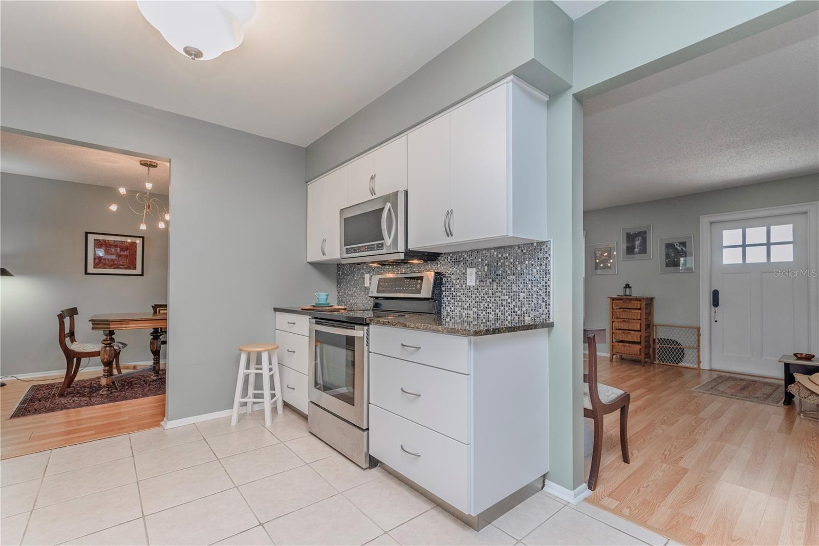 Kitchen with stainless steel appliances and granite counters.