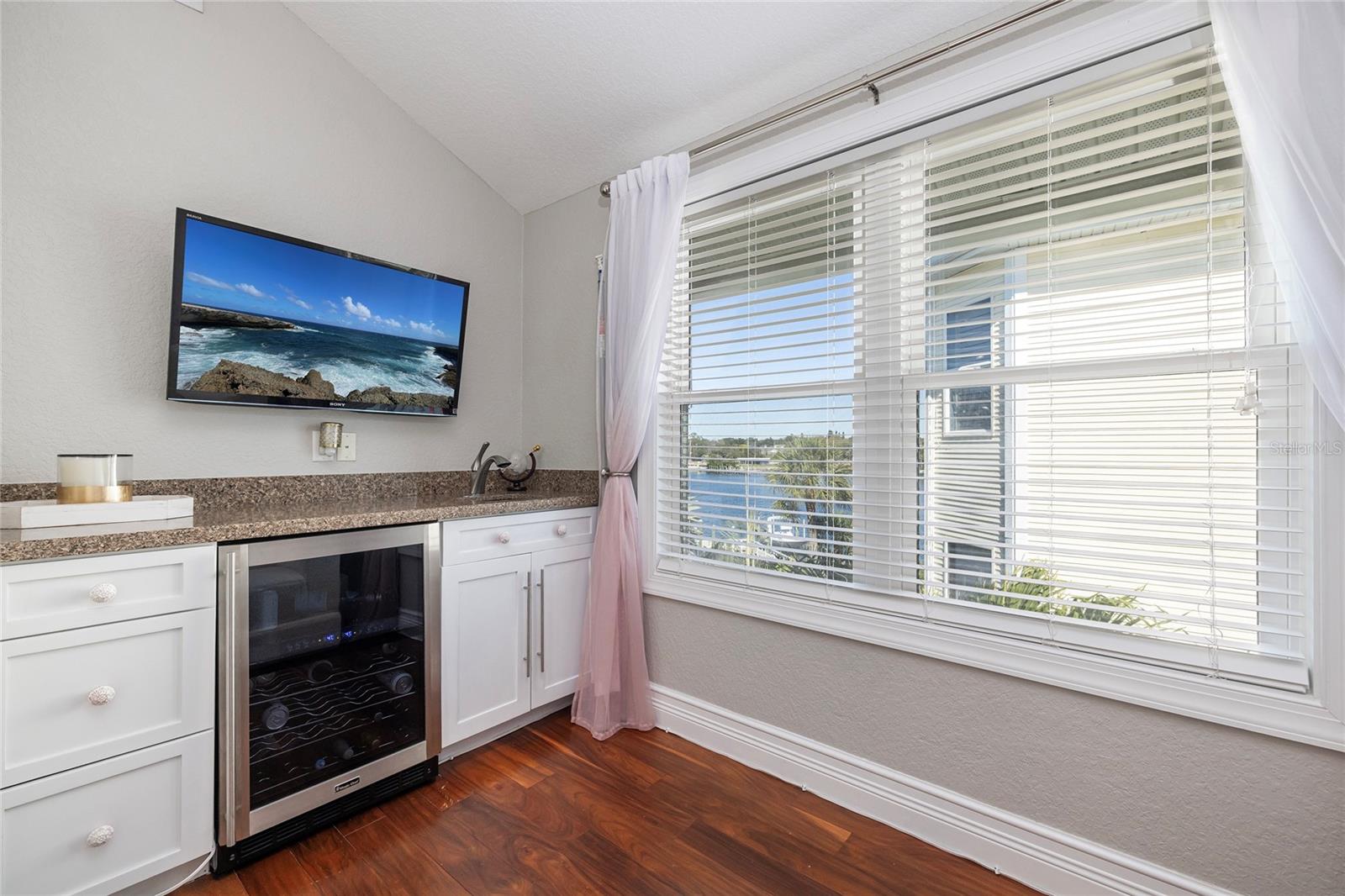 Wet bar with wine refrigerator