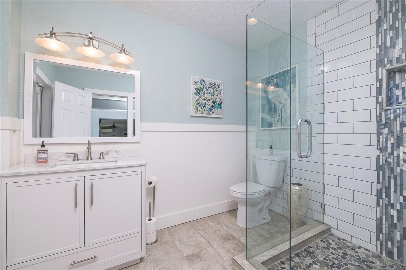 Ground level pool bath in recreation room not counted in square footage