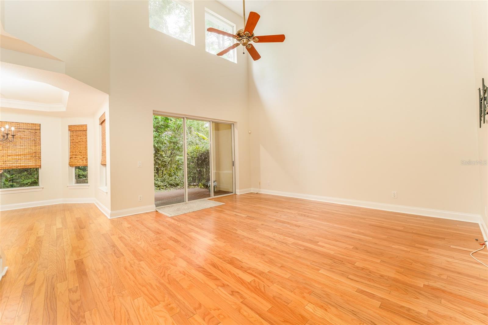 Great Room with Real Hardwood Flooring & Soaring Ceiling