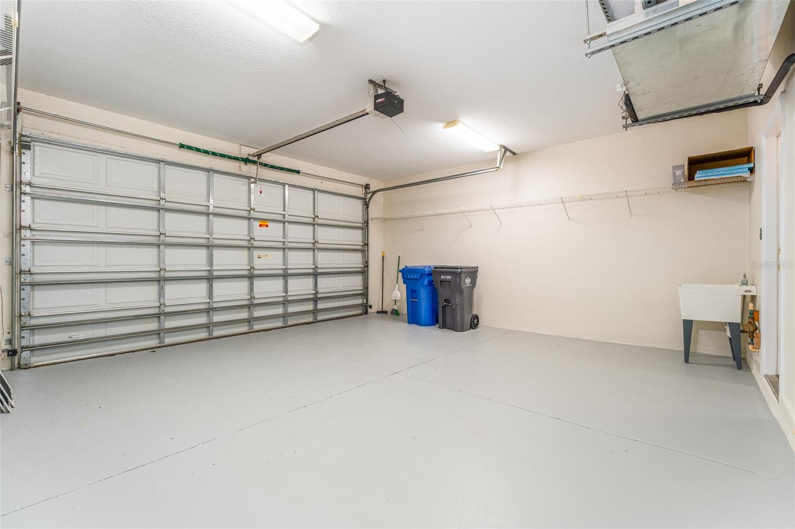 Spacious & Freshly Painted Two Car Garage with Utility SinK