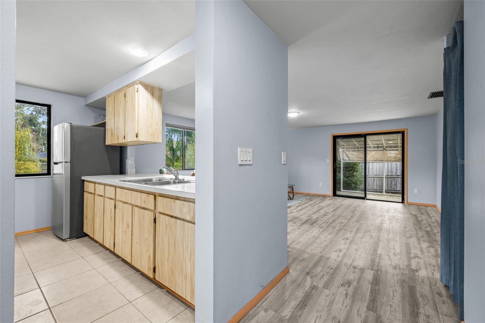 Entry way looking into Kitchen and Living Area