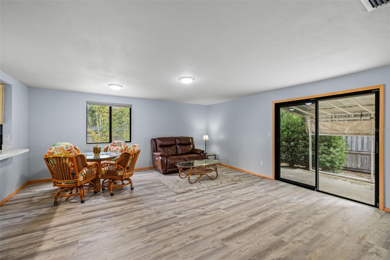 Dining & Living Area with Sliders to back open patio