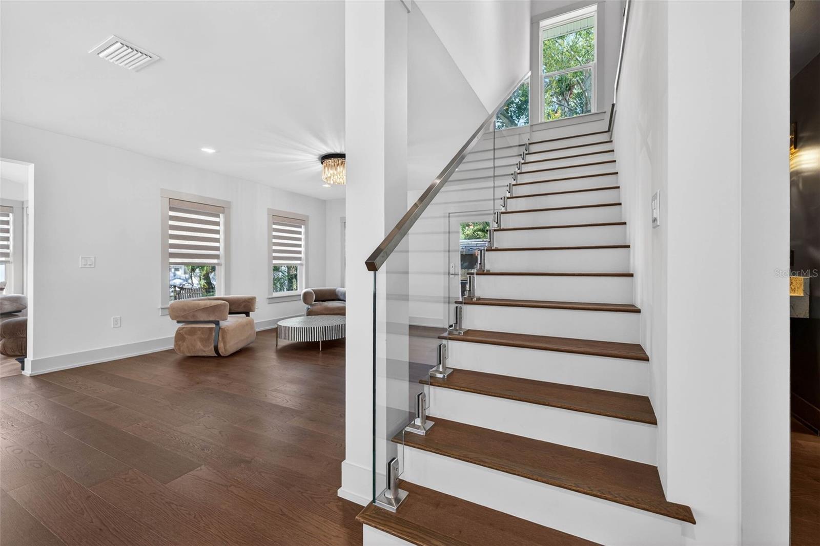 Custom stairway with floating rail.