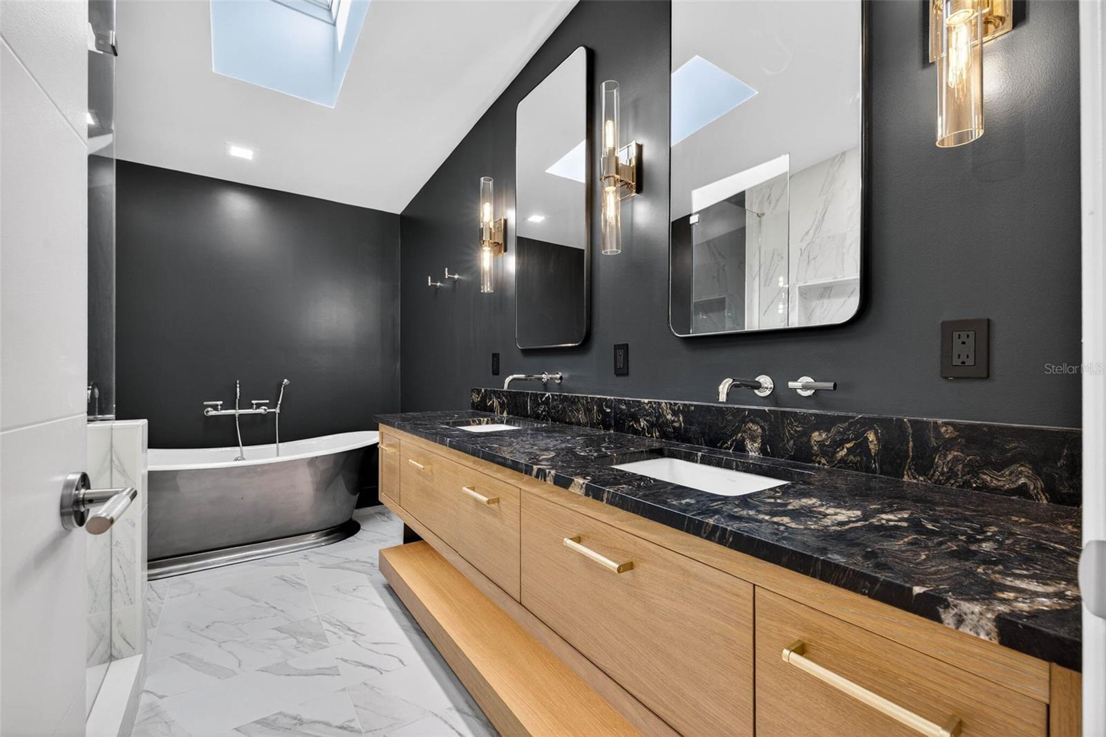 Main ensuite bath with sky light