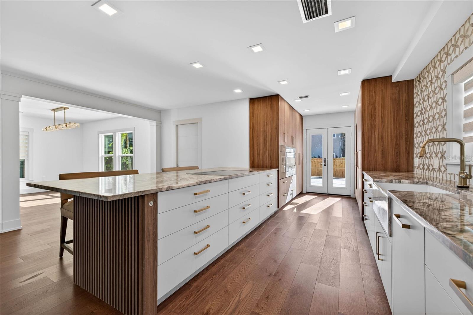 Custom cabinetry hidden outlets, pull outs with every detail attended to